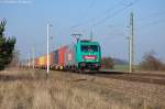 185 612-9 Emons Bahntransporte GmbH mit einem Containerzug in Demker und fuhr in Richtung Magdeburg weiter. 13.03.2014