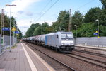 185 698-7 Railpool GmbH für HSL Logistik GmbH mit einem Kesselzug  Dieselkraftstoff oder Gasöl oder Heizöl (leicht)  in Bienenbüttel und fuhr weiter in Richtung Uelzen.