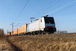 186 288 Railpool GmbH mit einem ZIH Containerzug in Nennhausen und fuhr weiter in Richtung Wustermark. 21.01.2020