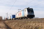 186 146-7 Railpool GmbH für Lotos Kolej Sp. z o.o. mit einem Containerzug in Nennhausen und fuhr weiter in Richtung Wustermark. 08.02.2020