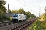 187 301-7 Railpool GmbH fuhr Lz durch Friesack, weiter in Richtung Nauen.
