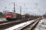 189 055-7 DB Schenker Rail Deutschland AG mit einem gemischtem Gterzug in Priort und fuhr in Richtung Golmer Kreuz weiter. 21.02.2013