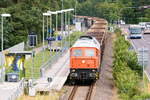 230 077-0 Bahnlogistik24 GmbH mit einem leeren Schrottzug von Brandenburg Altstadt nach Wismar, bei der Durchfahrt am Haltepunkt Premnitz Zentrum. 21.07.2020
