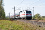 146 554-1 mit einer leeren IC2 Garnitur in Nennhausen und fuhr weiter in Richtung Wustermark.