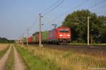 185 220-1 DB Schenker Rail Deutschland AG mit einem Containerzug bei Rathenow und fuhr in Richtung Stendal weiter. 25.07.2012