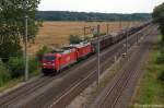 185 227-6 DB Schenker Rail Deutschland AG mit der Wagenlok 232 240-2 und einem gemischtem Güterzug bei Rathenow und fuhr in Richtung Stendal weiter. 28.07.2012