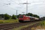 185 221-9 DB Schenker Rail Deutschland AG mit einem gemischtem Gterzug in Satzkorn und fuhr in Richtung Priort weiter.
