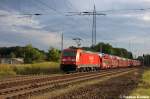 185 271-4 DB Schenker Rail Deutschland AG mit einem Opel Astra Autotransportzug in Satzkorn und fuhr in Richtung Priort weiter. 25.09.2012