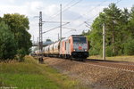 246 001-2 hvle - Havelländische Eisenbahn AG mit einem Getreidezug bei Friesack und fuhr weiter in Richtung Nauen.