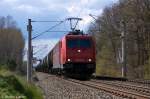 185 584-0 CBRail für HGK - Häfen und Güterverkehr Köln AG [HGK 2052] mit einem Kesselzug  Benzin oder Ottokraftstoffe  bei Nennhausen und fuhr in Richtung Wustermark weiter. 21.04.2012