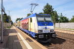 146 541-8  open Festival Uelzen  metronom Eisenbahngesellschaft mbH mit dem RE3 (ME 82122) von Uelzen nach Hamburg Hbf, bei der Ausfahrt aus Bienenbüttel.