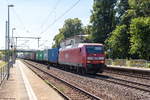 145 056-8 MEG - Mitteldeutsche Eisenbahn GmbH mit einem Conatinerzug in Friesack und fuhr weiter in Richtung Wittenberge.