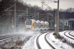ET 445.109 (445 109-2) ODEG - Ostdeutsche Eisenbahn GmbH als RE4 (RE 37323) von Rathenow nach Jterbog, bei der Schnee aufwirbelnden Ausfahrt aus Rathenow. 22.01.2013