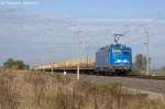 140 038-0 PRESS (140 851-7) mit einem leeren Holzzug in Vietznitz und fuhr in Richtung Nauen weiter.