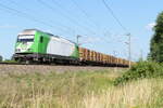 ER20-04 (223 143-9) SETG - Salzburger Eisenbahn TransportLogistik GmbH mit einem Holzzug in Nennhausen und fuhr weiter in Richtung Rathenow. 23.07.2021