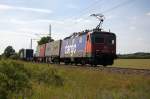 421 397-1 SBB Cargo mit einem Containerzug aus Richtung Salzwedel kommend in Stendal. Netten Gru zurck! 07.06.2014