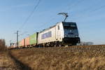 386 010-3 METRANS Rail s.r.o. mit einem umgeleiteten Containerzug in Nennhausen und fuhr weiter in Richtung Wustermark. 21.01.2020